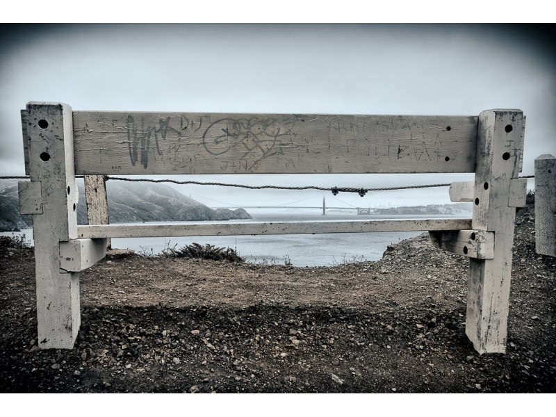 Golden Gate Bridge view through bench at Point Bonita