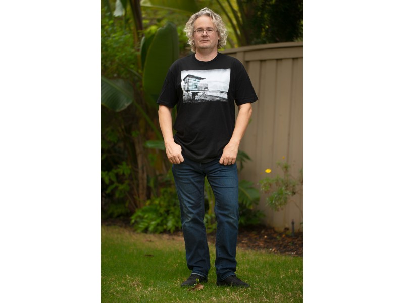 Roy wearing t-shirt with See Me at 23