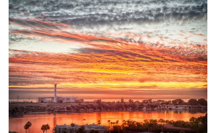 Carlsbad power plant at sunset with clouds