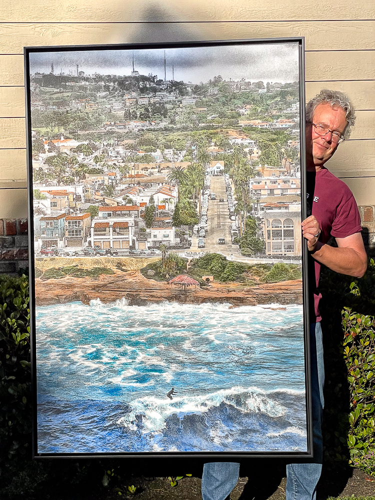 roy holding a 40x60 inch hand colored photo of the new All Mine!