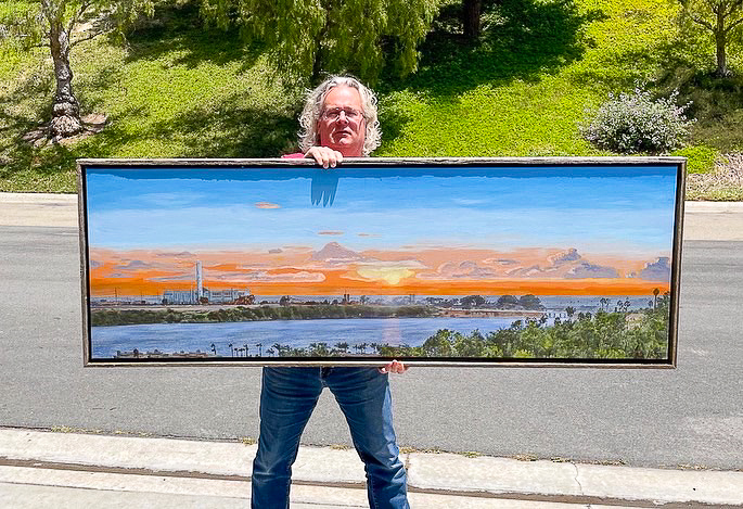 Roy holding sunset over agua hedionda lagoon with carlsbad power plant