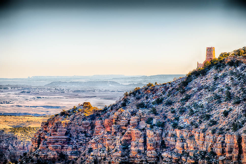 grand canyon desert watchtower with snow on canyon walls