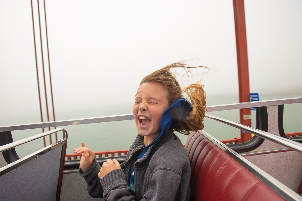 kate in double decker bus on golden gate bridge