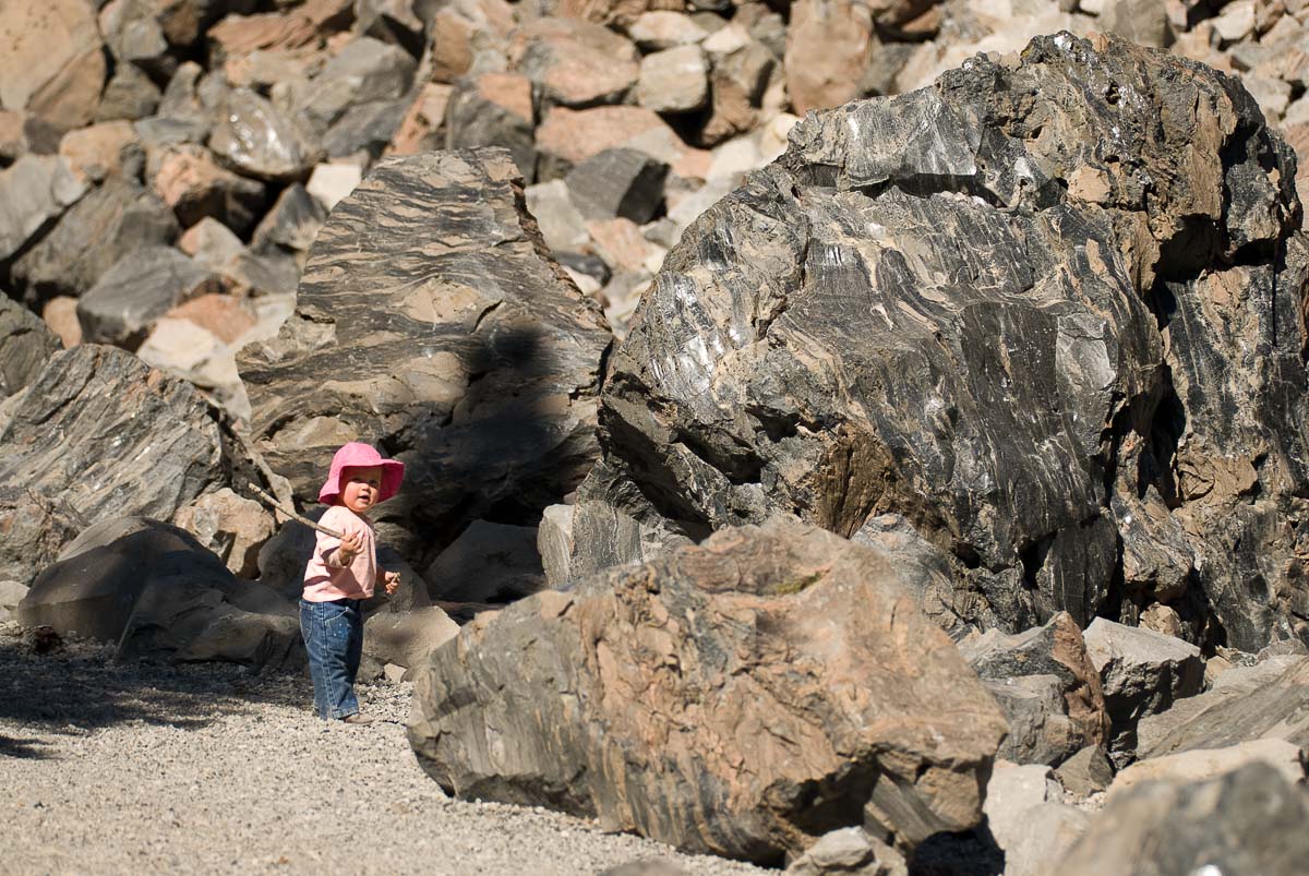little girl examining obsidian dome