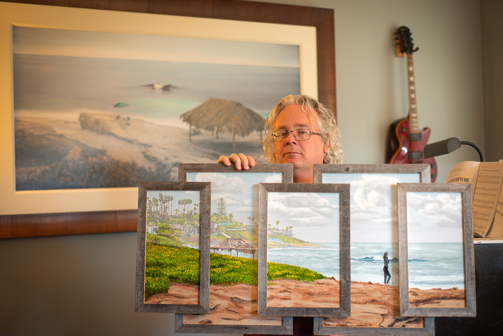 roy holding windansea shack oil painting