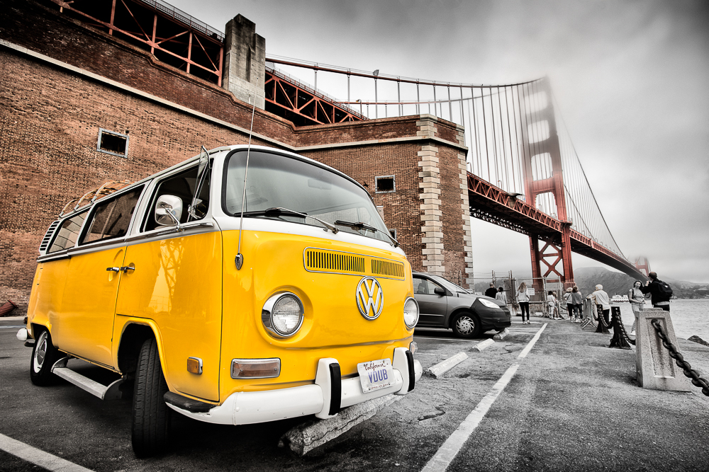 yellow volkswagen bus at golden gate bridge san francisco